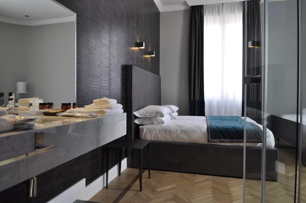 Place 24 Suites&Wellness Rom Zimmer foto