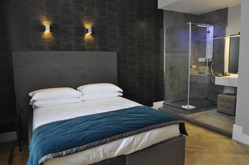 Place 24 Suites&Wellness Rom Zimmer foto